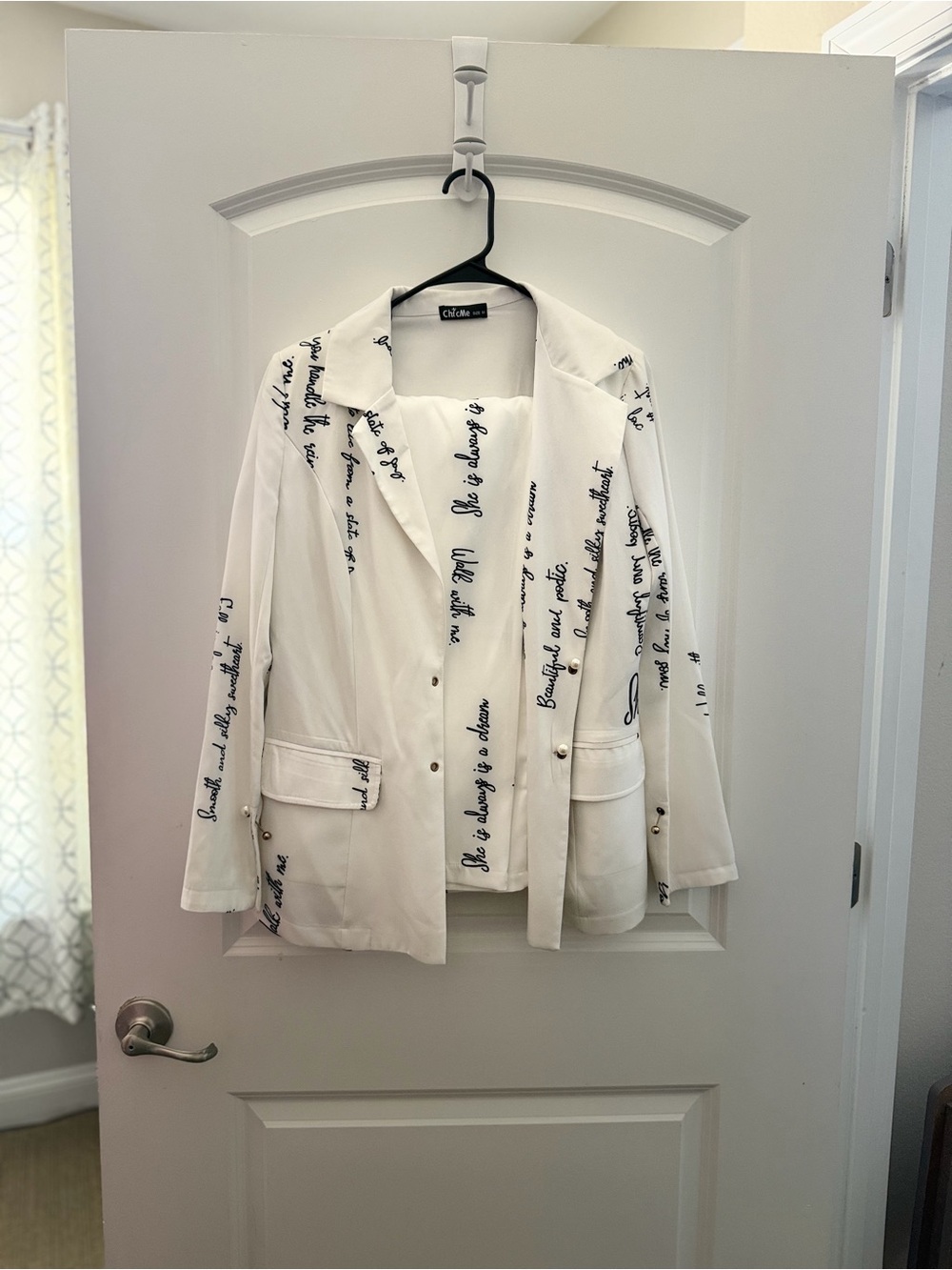 White Blazer Suit with Black Script Accent